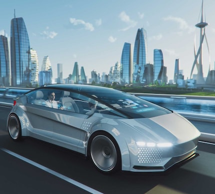 futuristic car driving through city